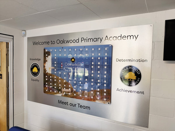 Custom Acrylic Meet and Greet Photoboard mounted onto Brushed Aluminium Panel featuring school name and logo. Custom design by BDP Creative Solutions for a welcoming atmosphere in educational institutions