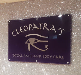 Custom acrylic display for beauty salon with sparkling design and logo